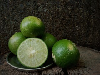 Group of fresh lemon on an old vintage wooden table