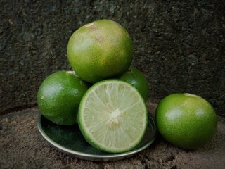 Group of fresh lemon on an old vintage wooden table