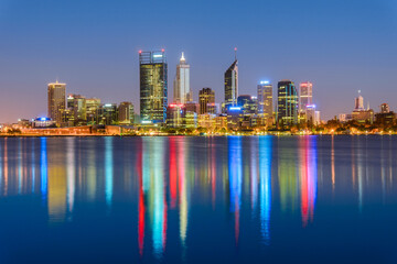 Fototapeta na wymiar Sunrise view of Perth city skyline and the Swan River seen from Mill Point. The modern city of Perth is the state capital of Western Australia, Australia.