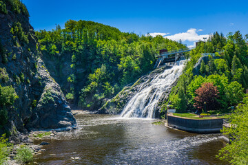 Obraz premium Riviere du Loup waterfall, created by an old hydroelectric powerplant in Riviere du Loup city, a small town of Bas St Laurent, region of Quebec (Canada)