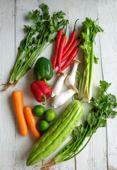 Common fresh farm produce at the wet market. Asian Greens. Local and imported ingredients for your culinary needs from fungi, leafy vegetables, herbs, tubers, bulbs, seeds and spices