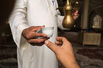 photo of traditional Arab coffee in mosque - obrazy, fototapety, plakaty
