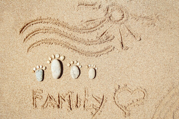 Stylishly beautiful drawings on sand background in nature