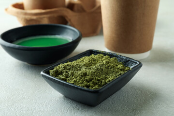 Concept of japanese tea with matcha on white textured table