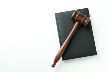 Judge gavel and law book on white background