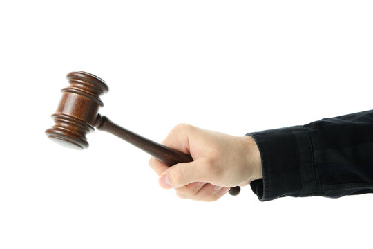 Man hand holds judge gavel, isolated on white background