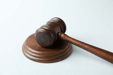 Wooden judge gavel on white background, close up