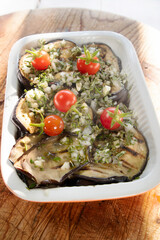Grilled aubergines flavored with rosemary, olive oil and garlic