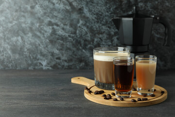 Concept of making Irish coffee on dark wooden table
