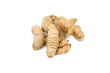 Turmeric spice rhizome isolated on white background. Heap of curcuma longa roots