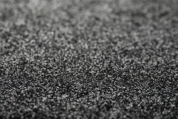 Shiny grey glitter as background. Bokeh effect