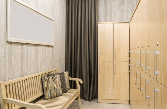 Dressing room interior with wardrobe and bench