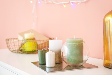 Aroma candles on table in room