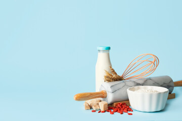 Ingredients for preparing bakery on color background