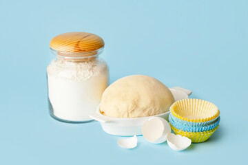 Ingredients for preparing bakery on color background