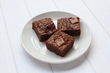 Homemade brownies with milk chocolate chunks on top