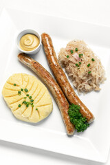 german thuringer sausage with mashed potato and sauerkraut meal