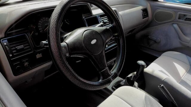 LA PAZ, BOLIVIA - Jul 11, 2021: The interior of an old Ford vehicle for sale at the 16 de Julio fair in the city of El Alto, Bolivia