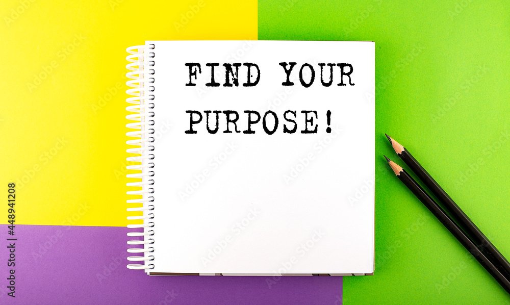 Poster minimal work space : sketchbook on the colorful background with find your purpose text