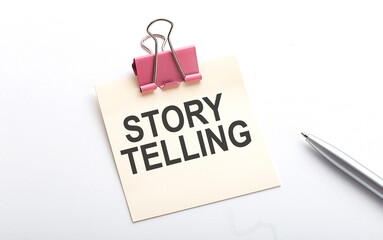STORY TELLING text on sticker with pen on the white background