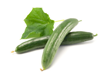 Fresh two japanese cucumbers with leaf isolated on white background. Healthy food