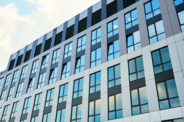 Facade of office building. Windows pattern on the residential building. Modern architecture style