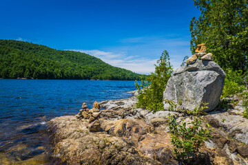 The blue waters of Lac du Poisson Blanc (Whitefish lake), in the eponym regional park. A park with typical landscape of the province of Quebec (Canada)