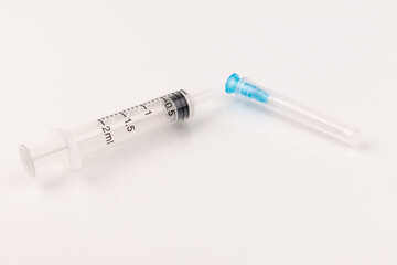 Medical plastic disposable syringe with needle. Applicable for vaccination.
