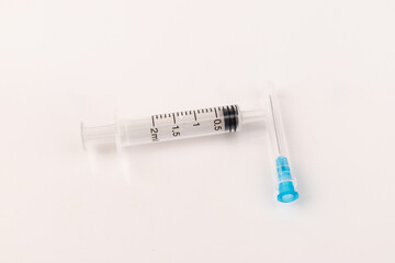 Medical plastic disposable syringe with needle. Applicable for vaccination.