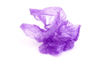 Fototapeta premium Closeup of used purple plastic disposable bag on white background