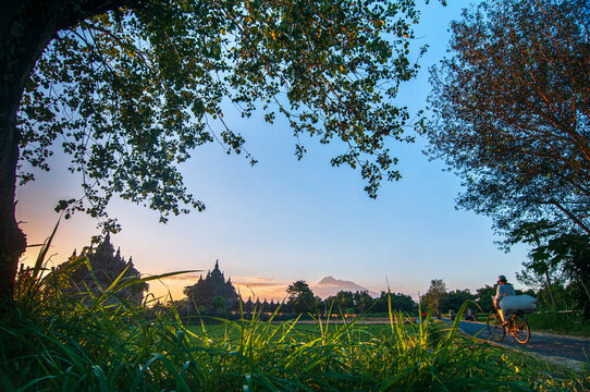 sunset view with the background of Plaosan temple and Merapi mountain. Klaten, central java, indonesia.