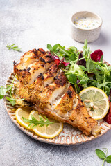 Pan roasted sea bass fish and green salad