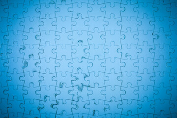 Blue Jigsaw puzzle background.