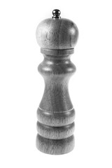 Wood pepper shakers on white background.