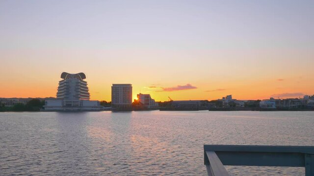 Footage of a sunset over Cardiff Bay waterfront in Cardiff, UK
