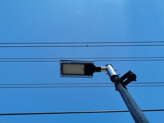 solar cell light pole and wires on beautiful sky background.