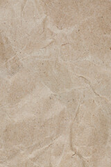 Textured crumpled packaging brown paper background.