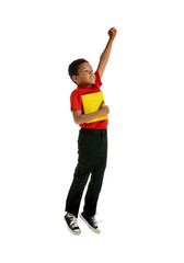 Jumping little African-American schoolboy on white background
