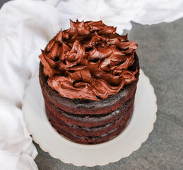 Delicious homemade pastry. Rich Dark Chocolate Cake. Moist, creamy and bitter chocolate taste. Best eaten fresh or refrigerated.