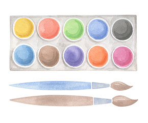 Set of watercolor paints and brushes. Freehand drawing. Art supplies for creativity.