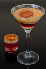 Txupito de foie y moscatel con frutos rojos