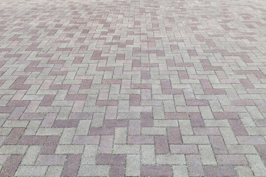 Abstract tile pavement patterns as a background.