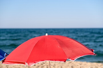 red umbrella on the beach