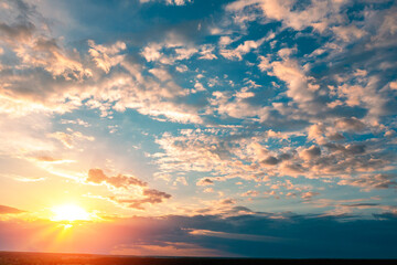 Colorful cloudy sky at sunset. Gradient color. Sky texture. Abstract nature background