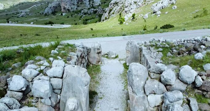 CORUM, TURKEY - Jul 07, 2021: A low drone view of Lion Gate in Hattusa Hattite ancient city in Turkey - bronze age