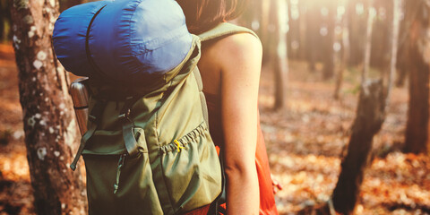 Backpacker traveling in the forest alone