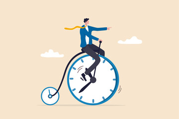 Productivity or efficiency spending time to finish work, time management or work life balance concept, businessman riding vintage bicycle with front wheel as clock and small wheel as stopwatch timer. - obrazy, fototapety, plakaty