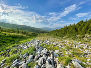  Ural Mountains near Dyatlov pass in summer in cloudy weather. Russia