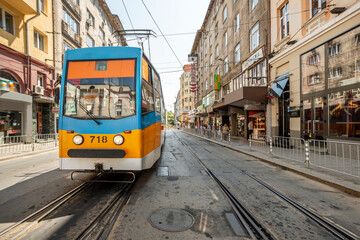 Photographing trams in the middle of the road in the center of city of Sofia in Bulgaria