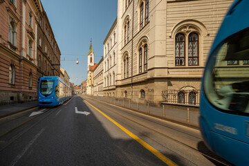 Obraz na płótnie Canvas Photographing trams in the middle of the road in the center of city of Zagreb in Croatia